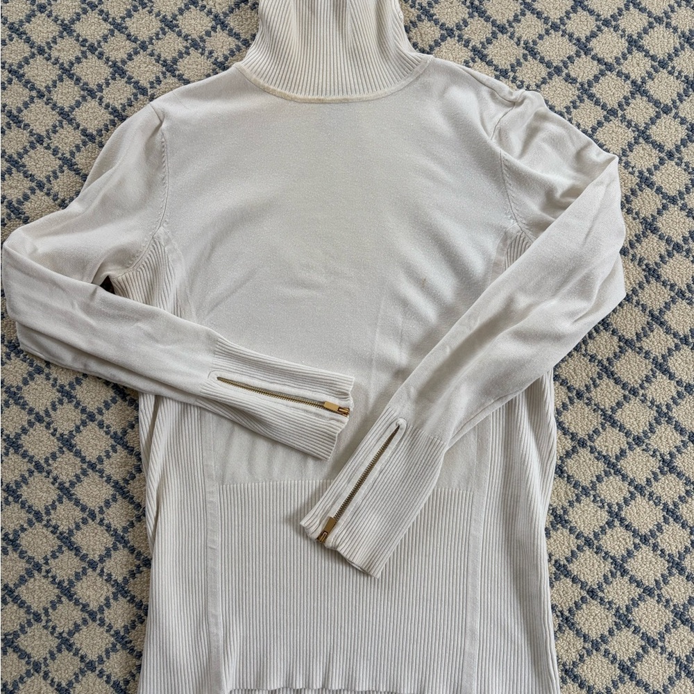 Cache Winter white turtleneck sweater with gold zippers at cuffs